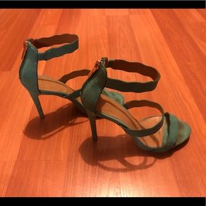 Green open toe heels.